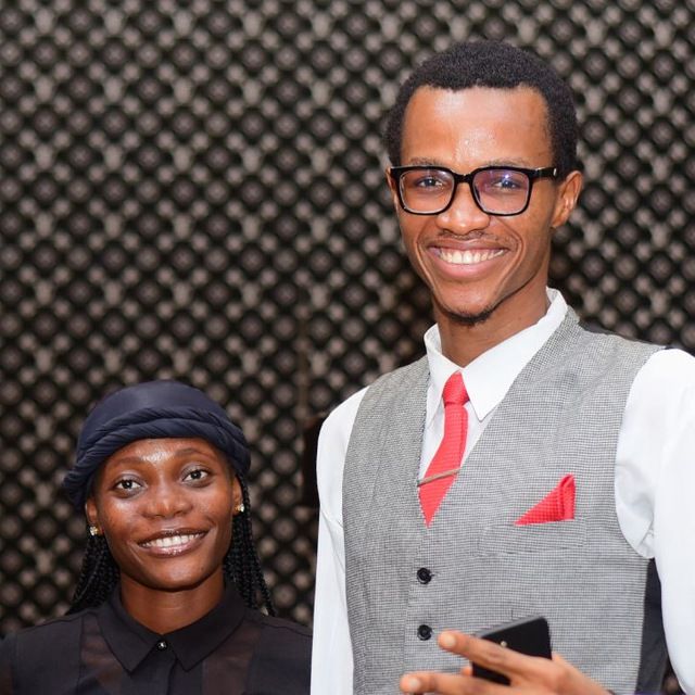 Glory and Precious at an evening event