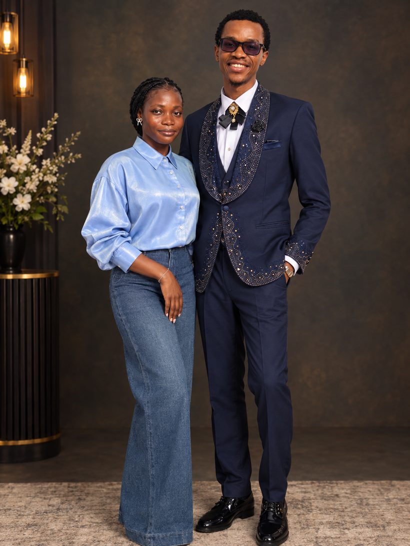 Glory and Precious, he in a navy embellished suit