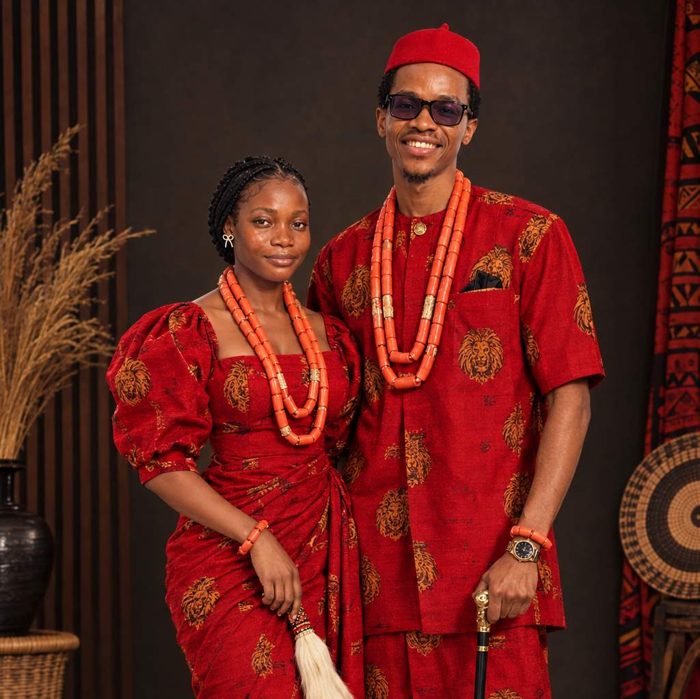 Glory and Precious smiling in traditional attire